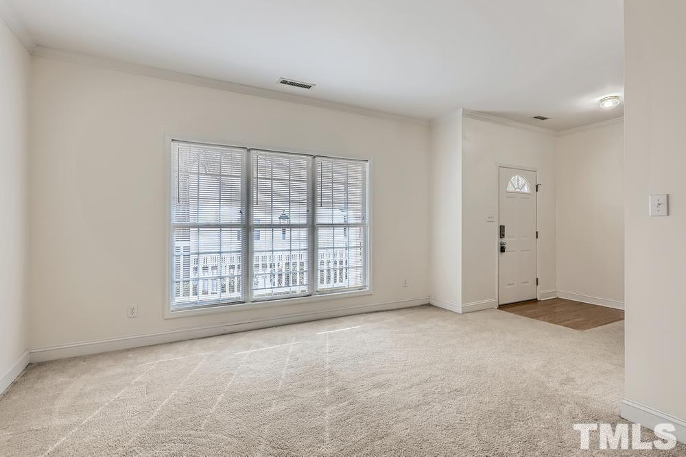 205 Bridgepath Drive Cary, NC 27513 - Photo 10 of 28 an empty room with windows