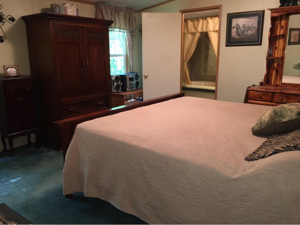 7702 Wells Boone Road Norton, VA 24273 - Photo 15 of 36 Master Bedroom Suite