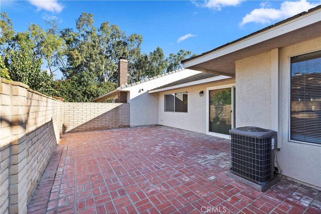 17241 Candleberry Irvine, CA 92612 - Photo 2 of 10 a backyard of a house with lots of green space