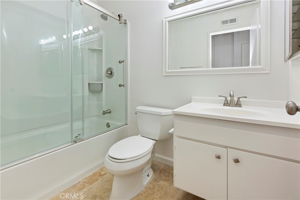 17241 Candleberry Irvine, CA 92612 - Photo 8 of 10 a bathroom with a sink a toilet and shower