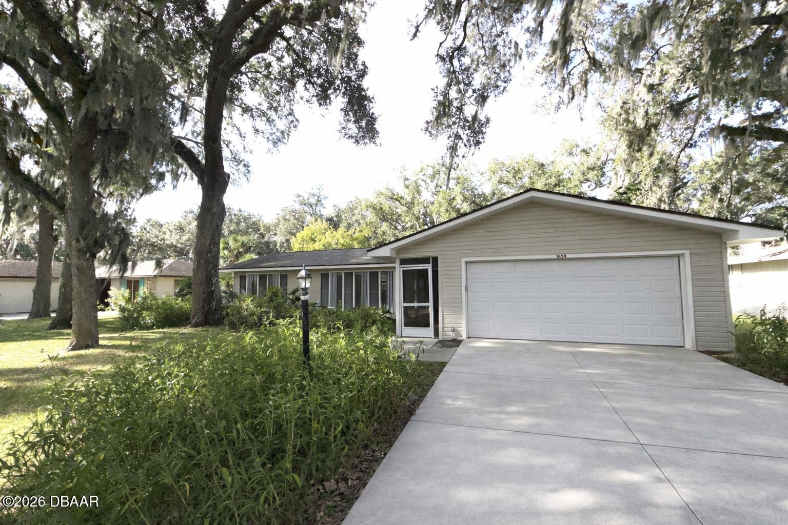 1854 Lime Tree Drive Edgewater, FL 32141 - Photo 1 of 12 Front