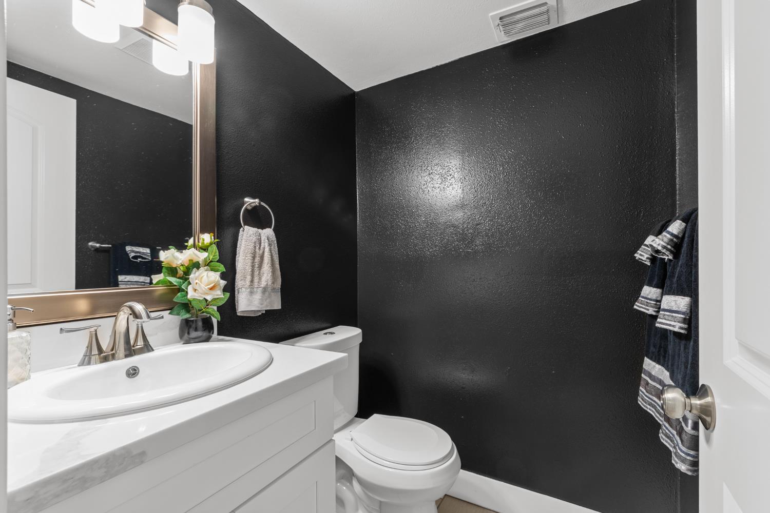 7135 Mathis Court Citrus Heights, CA 95610 - Photo 18 of 39 a bathroom with a sink toilet and shower