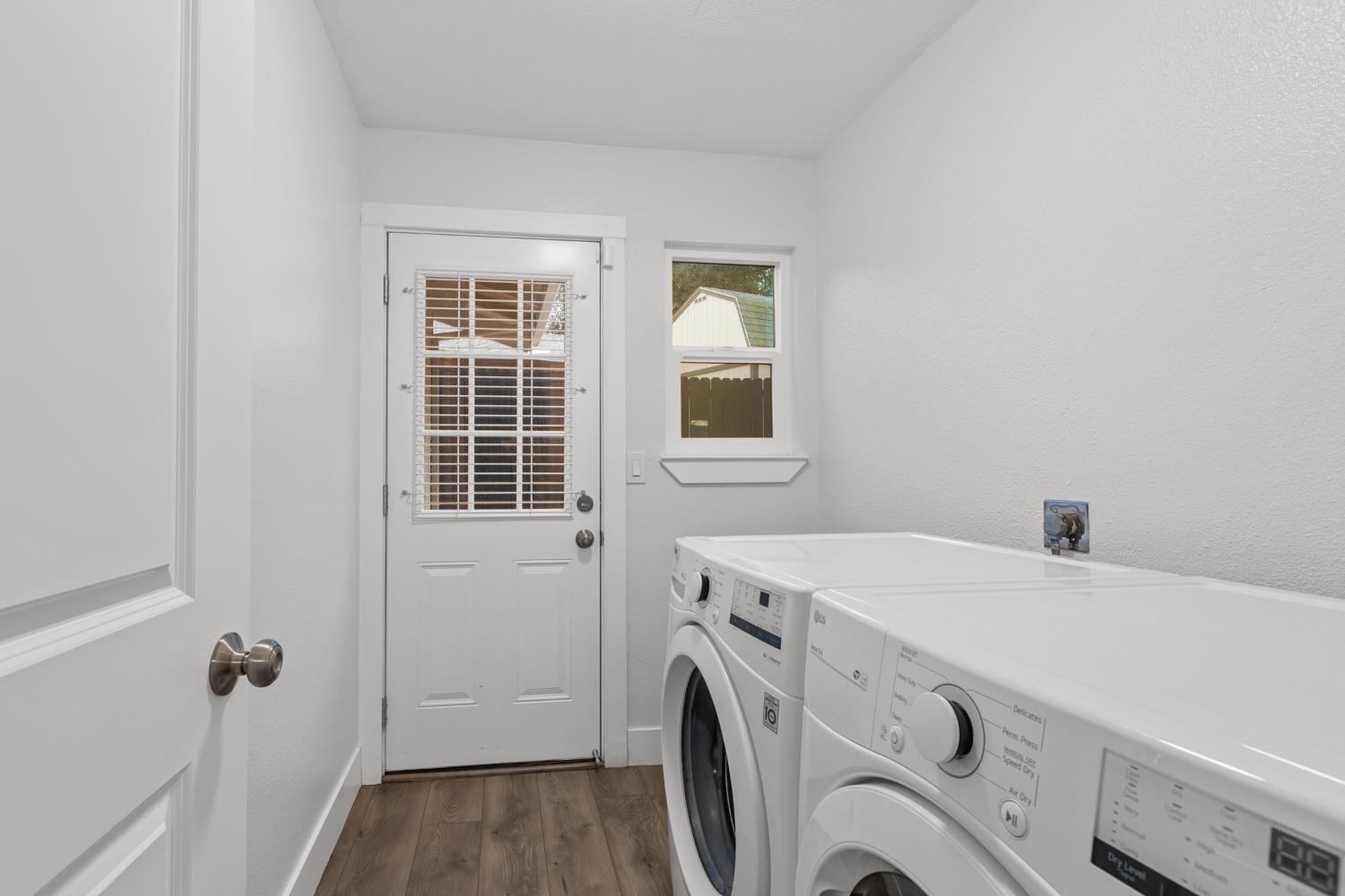 7135 Mathis Court Citrus Heights, CA 95610 - Photo 19 of 39 a utility room with dryer and washer