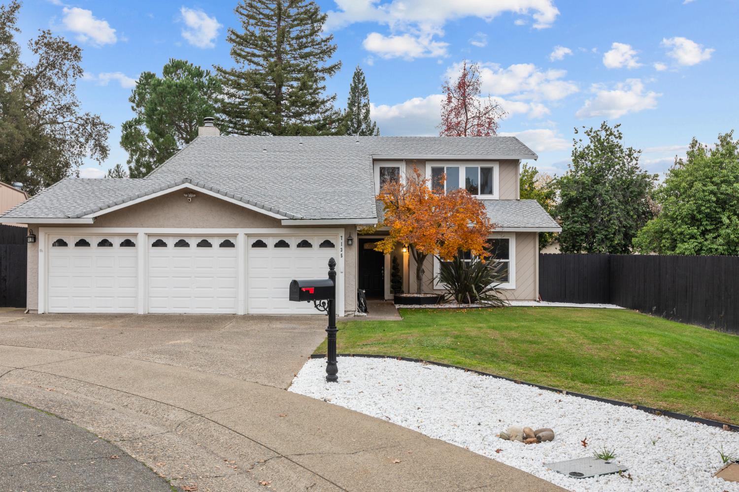 7135 Mathis Court Citrus Heights, CA 95610 - Photo 2 of 39 a front view of a house with a yard and garage