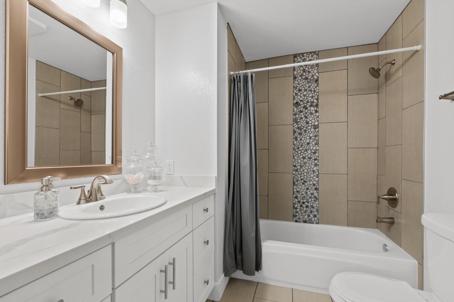 7135 Mathis Court Citrus Heights, CA 95610 - Photo 25 of 39 a bathroom with a granite countertop sink toilet and shower