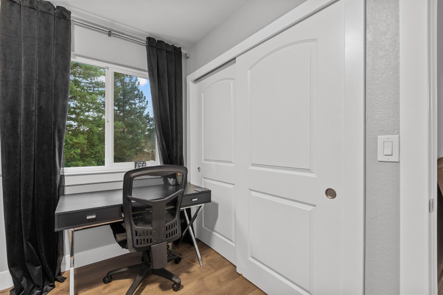 7135 Mathis Court Citrus Heights, CA 95610 - Photo 29 of 39 a view of a workspace with furniture and a window