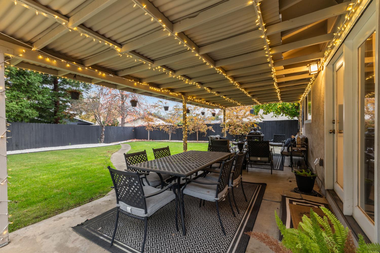 7135 Mathis Court Citrus Heights, CA 95610 - Photo 31 of 39 a view of a backyard with sitting area