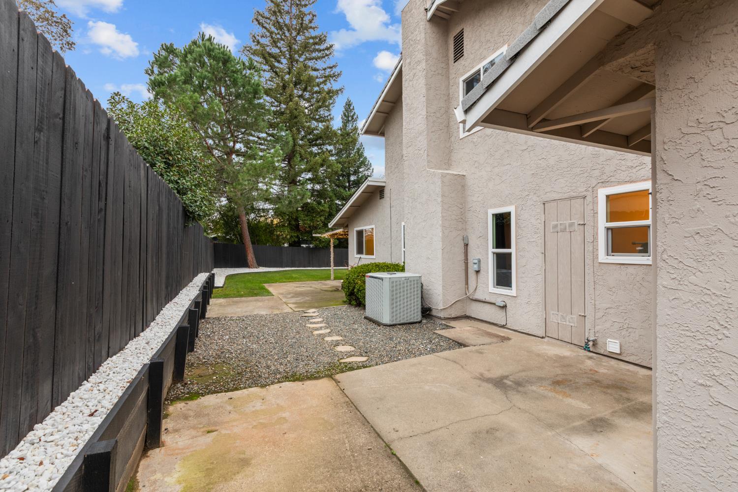 7135 Mathis Court Citrus Heights, CA 95610 - Photo 38 of 39 a view of a back yard with wooden fence
