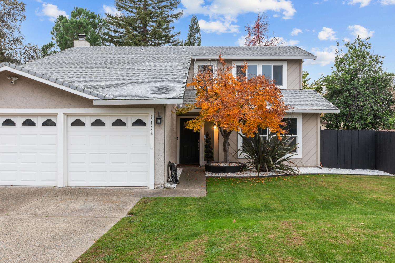 7135 Mathis Court Citrus Heights, CA 95610 - Photo 4 of 39 a front view of a house with a yard