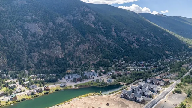 a view of a lake with mountain