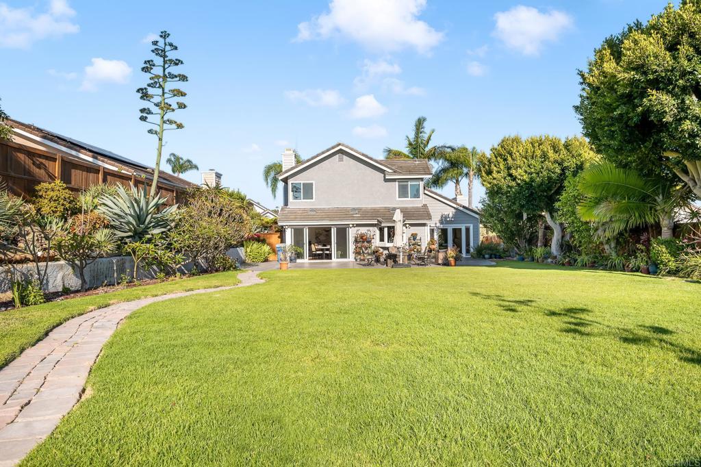 1592 Hawk View Drive Encinitas, CA 92024 - Photo 29 of 55 a front view of a house with a garden