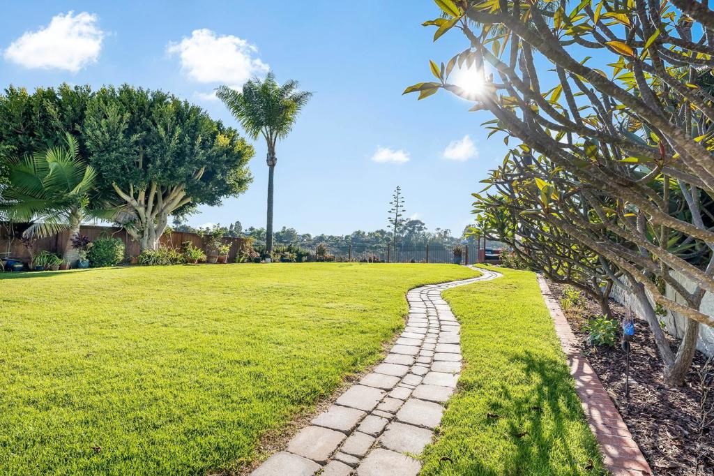 1592 Hawk View Drive Encinitas, CA 92024 - Photo 32 of 55 a view of a swimming pool with an outdoor space and seating area