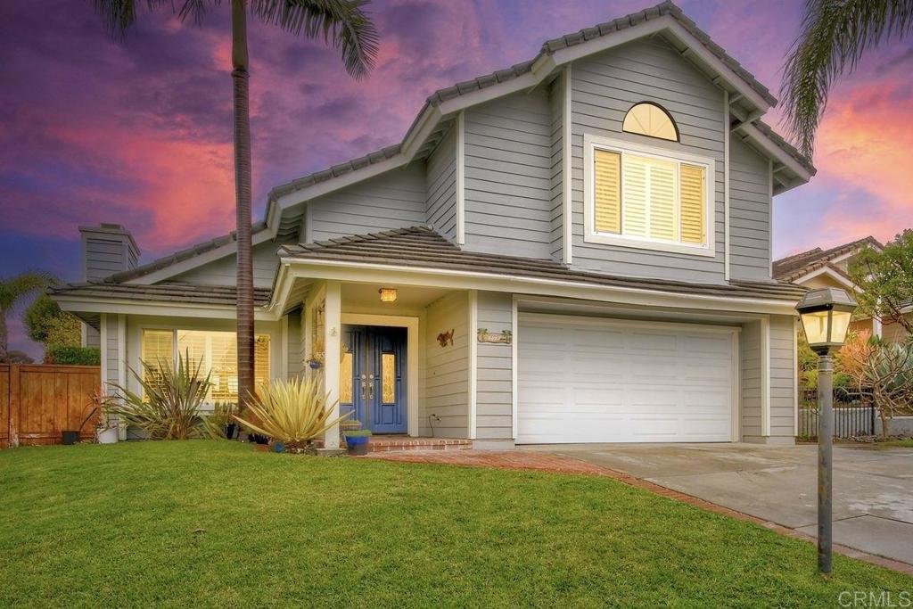 1592 Hawk View Drive Encinitas, CA 92024 - Photo 38 of 55 a front view of a house with a garden and yard