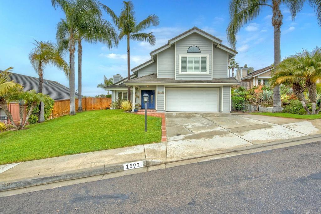 1592 Hawk View Drive Encinitas, CA 92024 - Photo 39 of 55 a front view of house with yard and green space