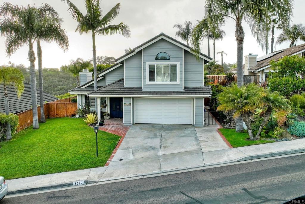 1592 Hawk View Drive Encinitas, CA 92024 - Photo 41 of 55 a front view of house with yard and green space