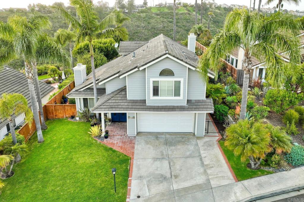 1592 Hawk View Drive Encinitas, CA 92024 - Photo 45 of 55 a front view of a house with a garden