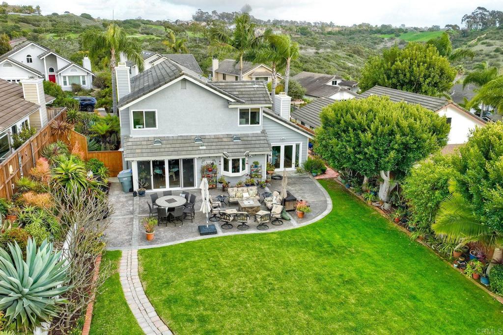 1592 Hawk View Drive Encinitas, CA 92024 - Photo 50 of 55 a view of a house with backyard sitting area and garden