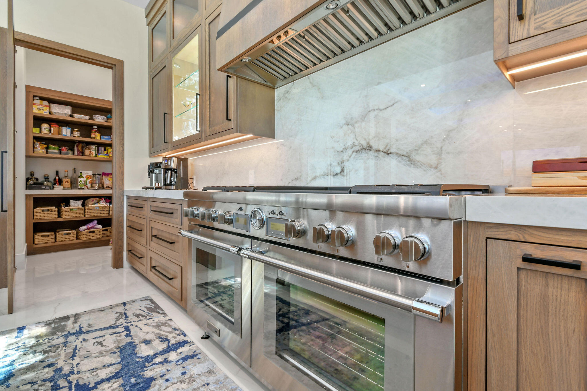 1060 Fairview Lane Singer Island, FL 33404 - Photo 17 of 82 a kitchen with stainless steel appliances granite countertop a stove and a cabinets