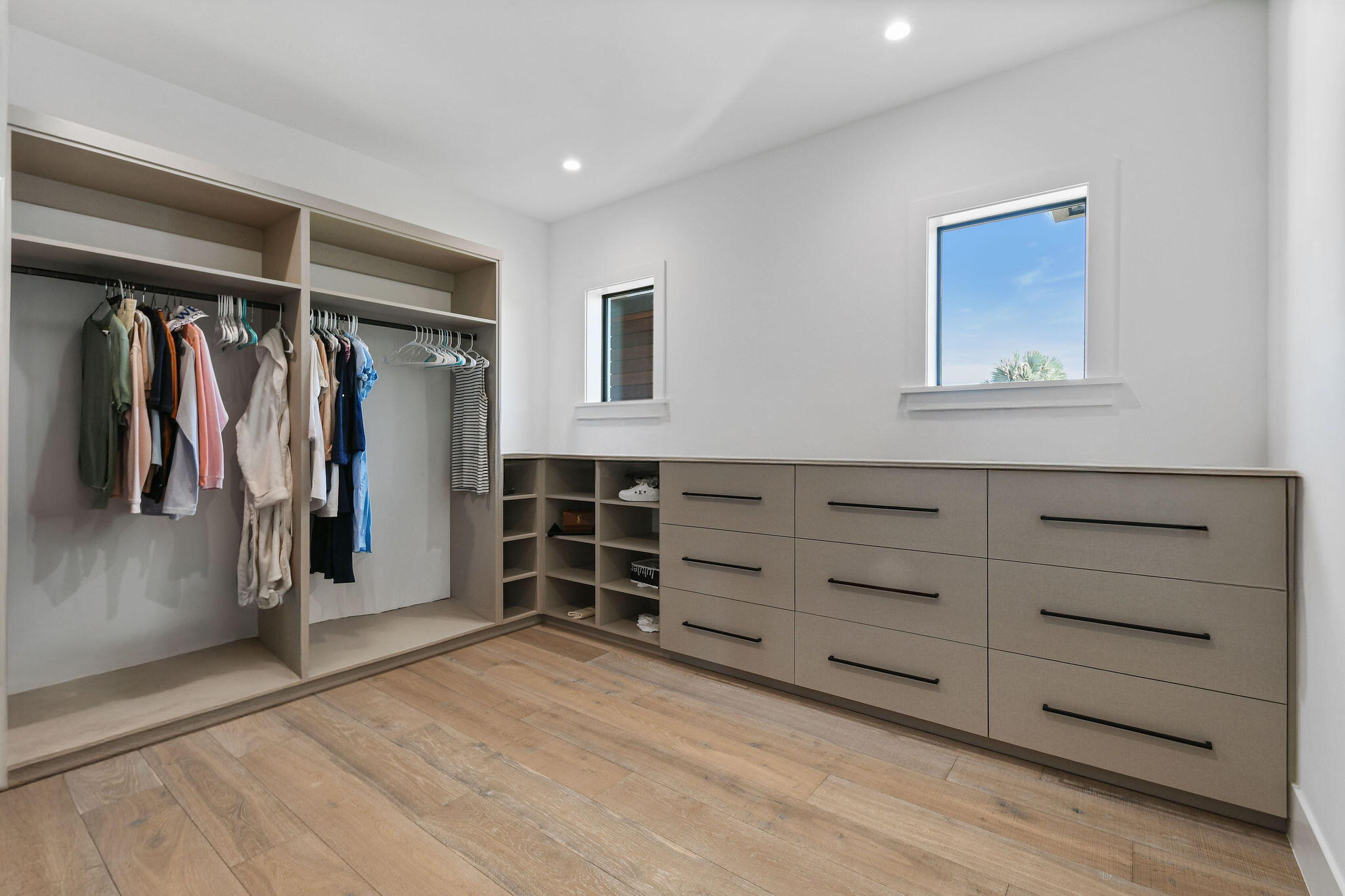 1060 Fairview Lane Singer Island, FL 33404 - Photo 41 of 82 a view of walk in closet with clothes and shoes