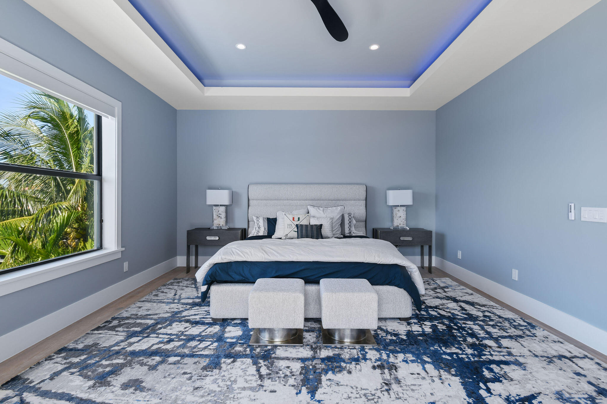 1060 Fairview Lane Singer Island, FL 33404 - Photo 46 of 82 a bed sitting in a bedroom next to a window