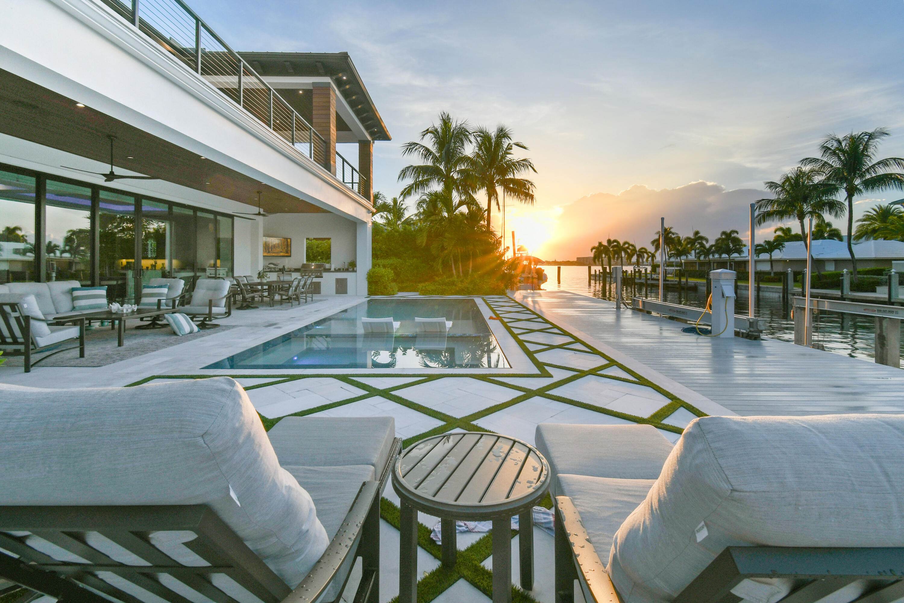 1060 Fairview Lane Singer Island, FL 33404 - Photo 60 of 82 a view of a patio with swimming pool table and chairs