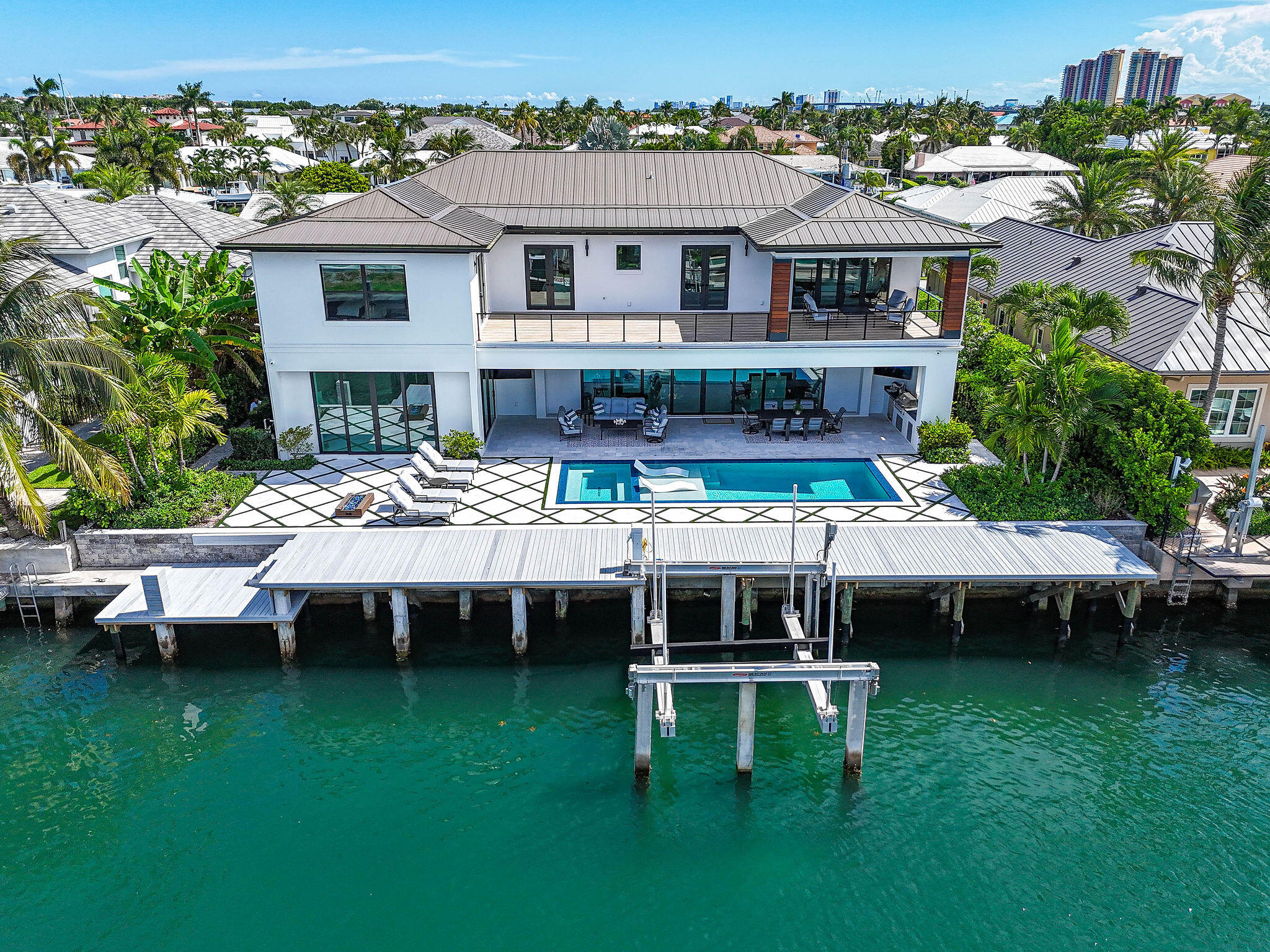 1060 Fairview Lane Singer Island, FL 33404 - Photo 7 of 82 a view of a house with a table chairs and a table