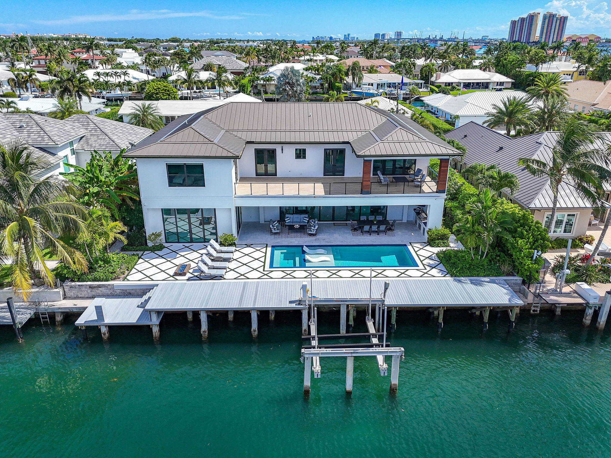 1060 Fairview Lane Singer Island, FL 33404 - Photo 79 of 82 a aerial view of a house with a garden and swimming pool