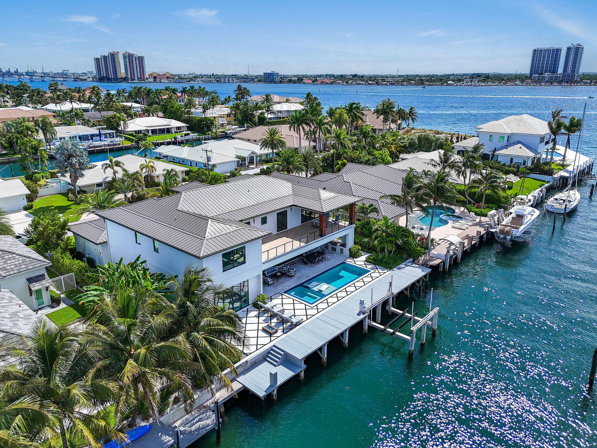 1060 Fairview Lane Singer Island, FL 33404 - Photo 81 of 82 an aerial view of a house with a garden and lake view