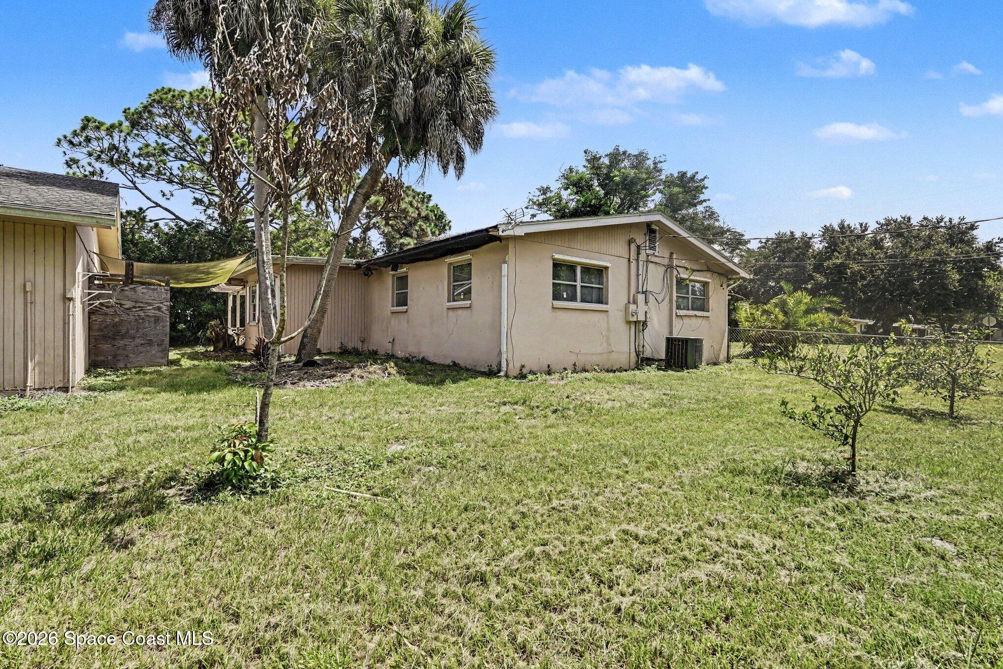 1406 Northeast Tropicana Road Palm Bay, FL 32905 - Photo 24 of 37 027_file_7490