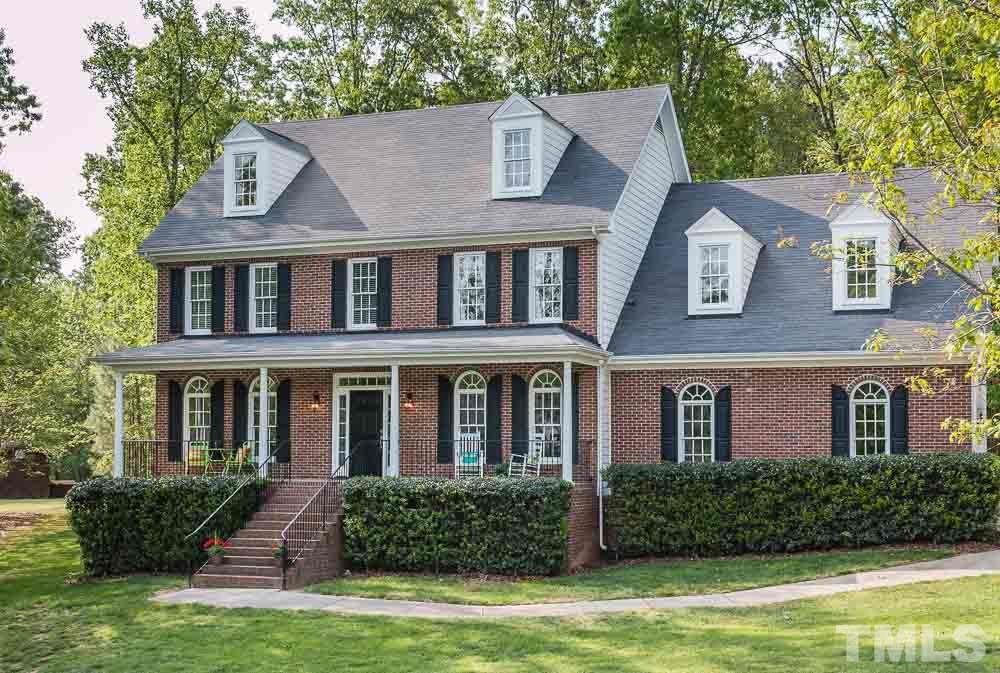 2908 Sunnystone Way Raleigh, NC 27613 - Photo 1 of 25 front view of a house with a yard