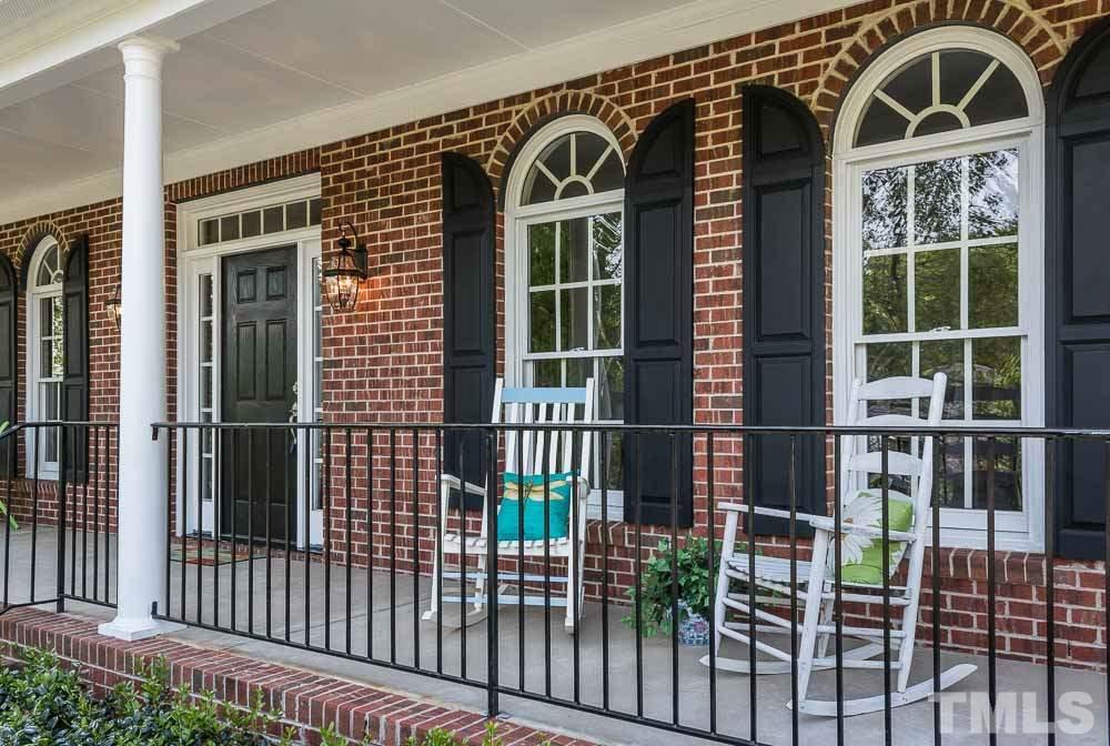 2908 Sunnystone Way Raleigh, NC 27613 - Photo 2 of 25 a view of front door and potted plants