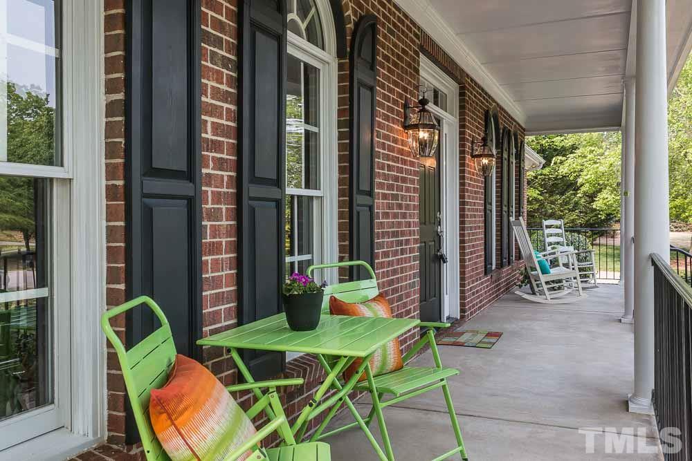 2908 Sunnystone Way Raleigh, NC 27613 - Photo 23 of 25 a backyard of a house with seating space