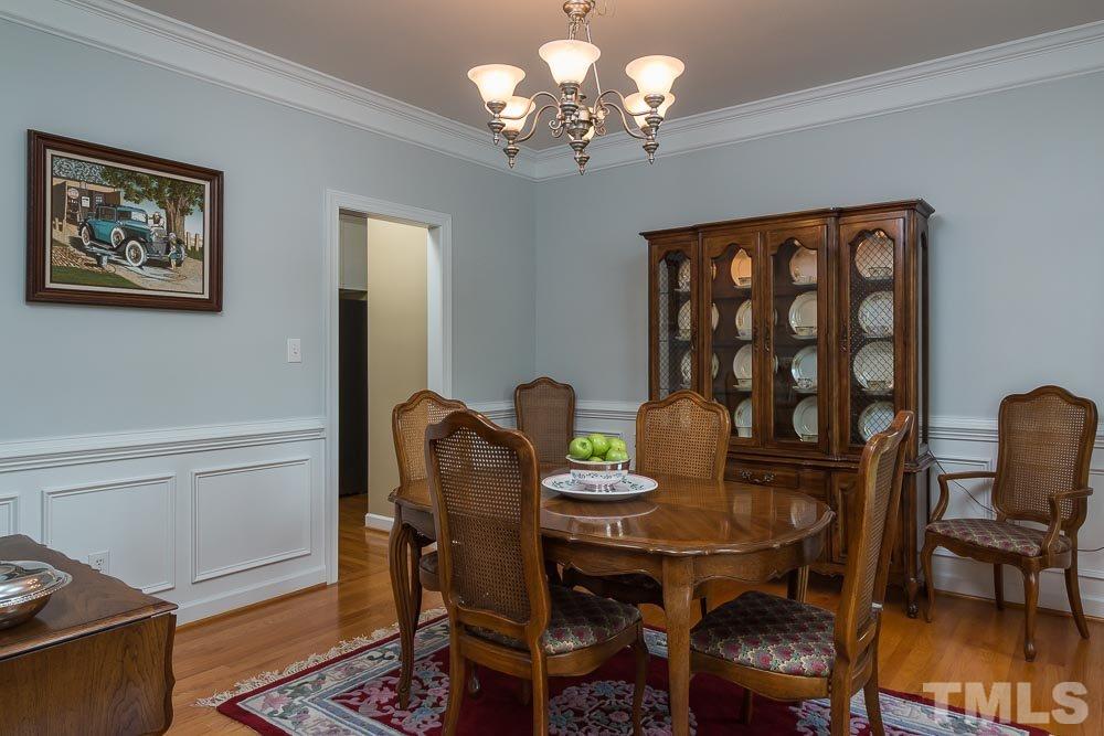 2908 Sunnystone Way Raleigh, NC 27613 - Photo 6 of 25 a dining room with furniture and window