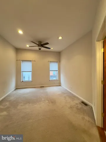 a view of a livingroom with a staircase