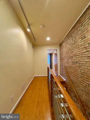 a view of hallway with stairs