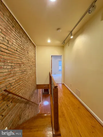 a view of hallway with stairs