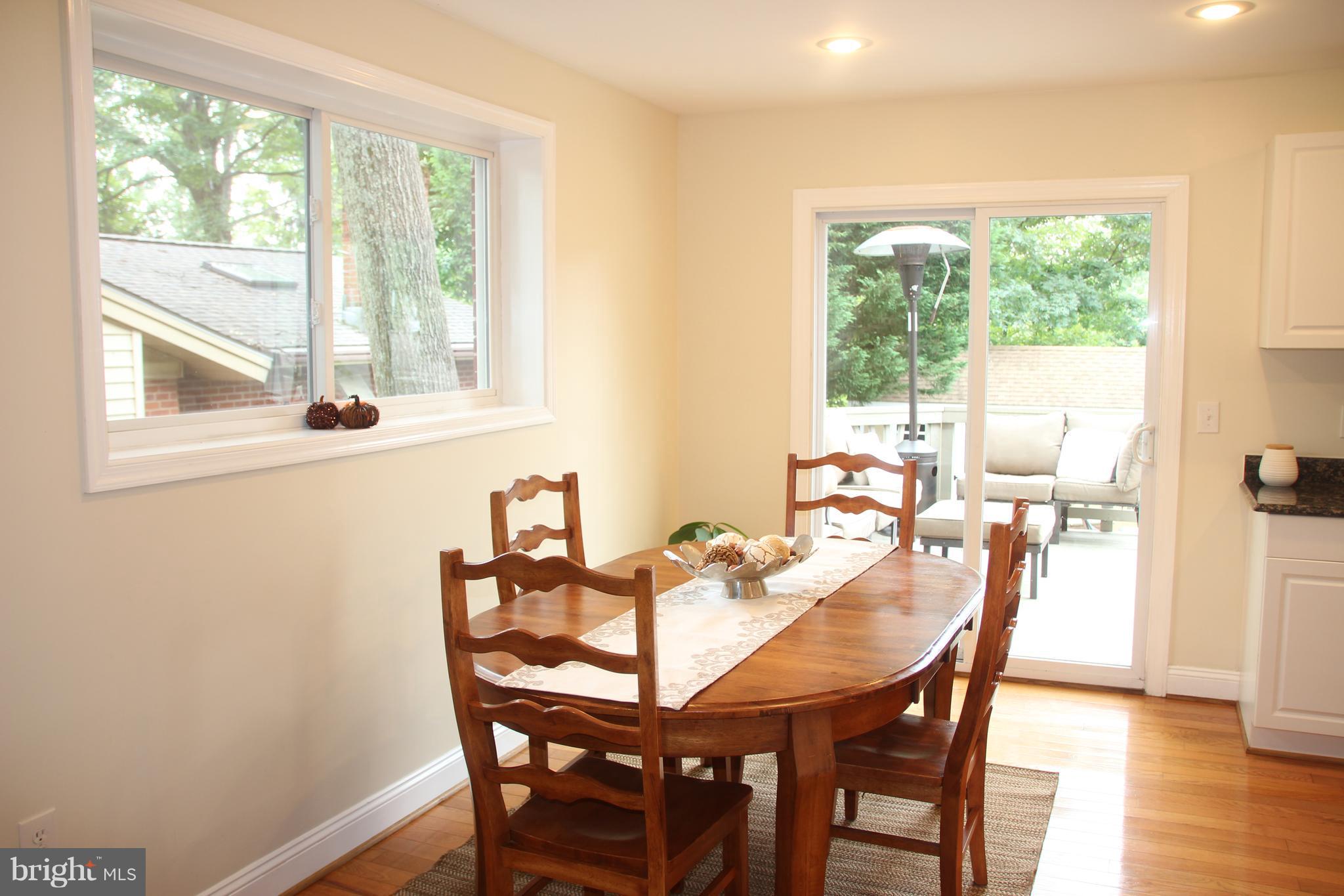 2518 Harmon Road Silver Spring, MD 20902 - Photo 8 of 29 Large tablespace kitchen leading to deck