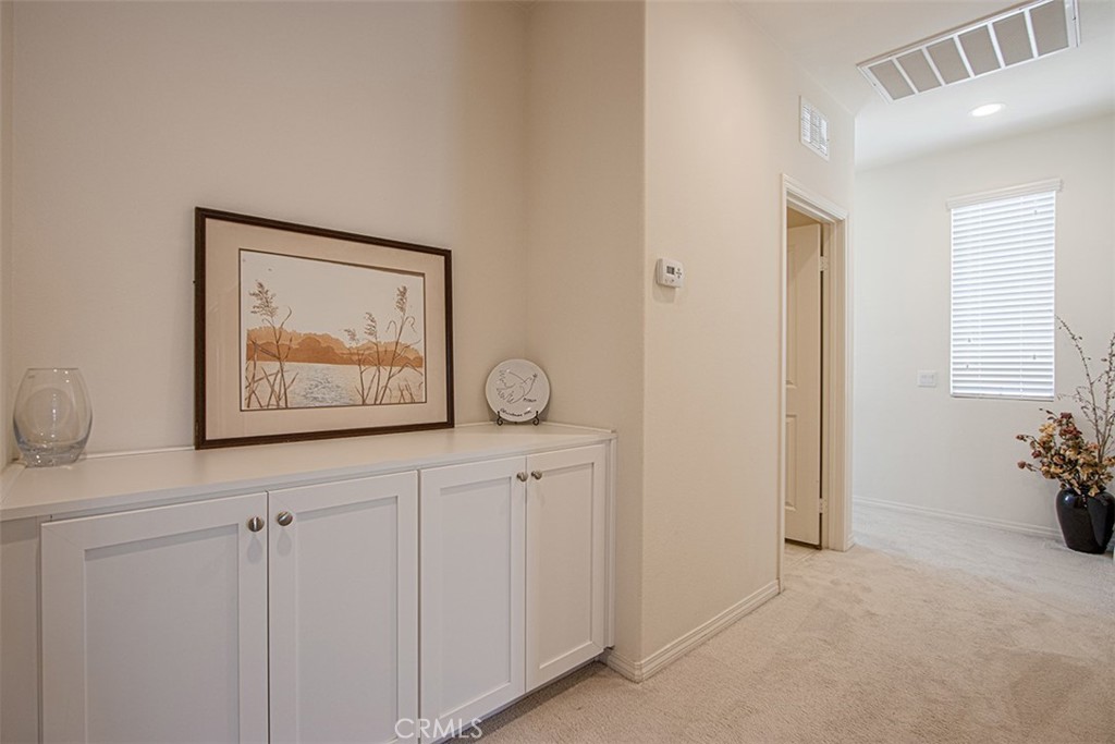 1509 Granada Road Upland, CA 91786 - Photo 17 of 31 a view of a hallway with front door