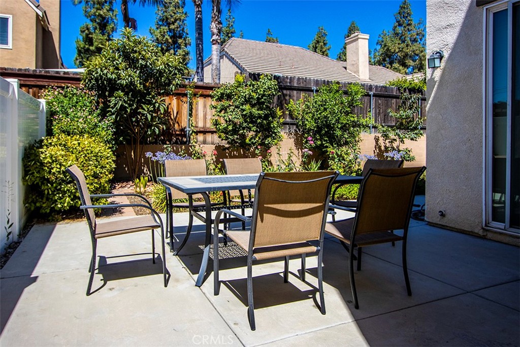 1509 Granada Road Upland, CA 91786 - Photo 21 of 31 a view of a chairs and table in backyard