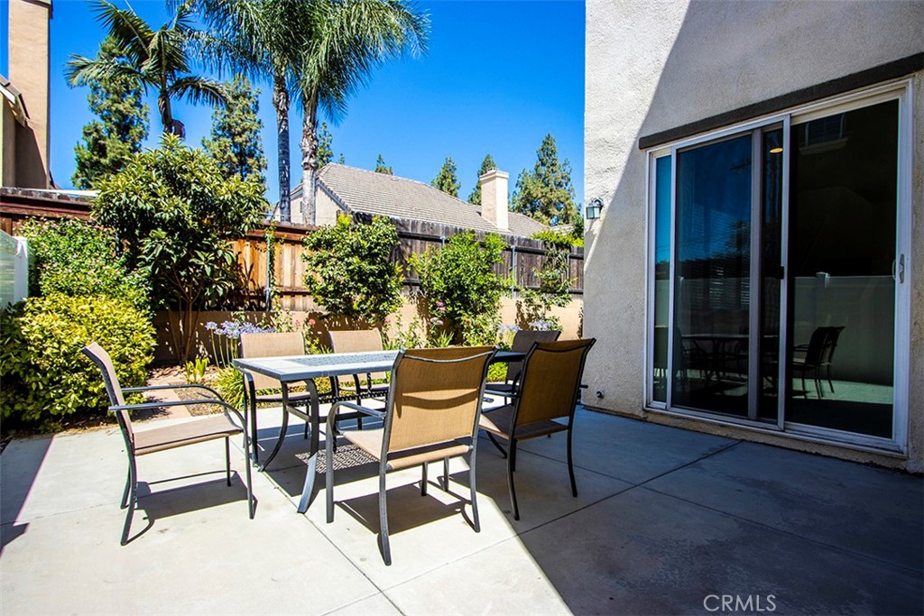 1509 Granada Road Upland, CA 91786 - Photo 22 of 31 a view of a dining room with furniture and front view of a house