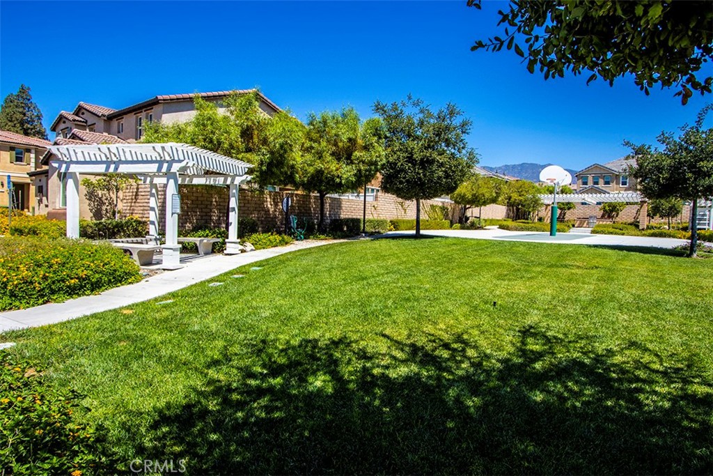 1509 Granada Road Upland, CA 91786 - Photo 26 of 31 a view of a house with a yard porch and sitting area