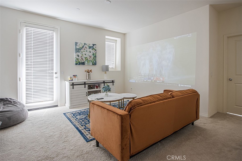 1509 Granada Road Upland, CA 91786 - Photo 8 of 31 a living room with furniture and window