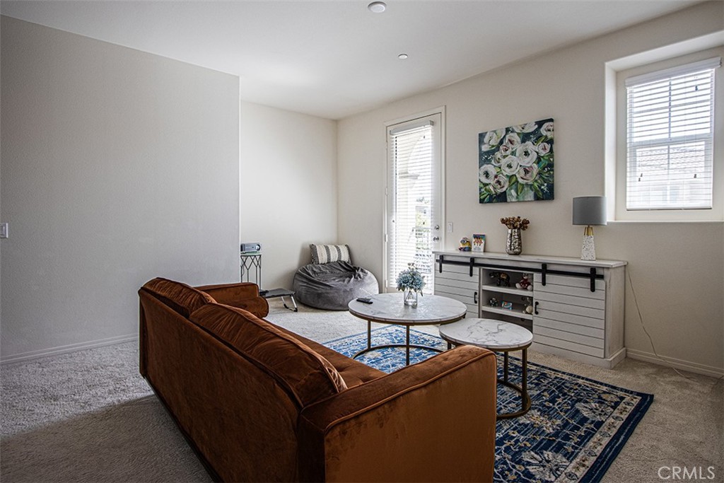 1509 Granada Road Upland, CA 91786 - Photo 9 of 31 a living room with furniture and a window