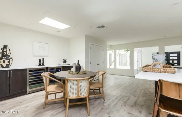 a kitchen with stainless steel appliances a sink stove top oven and cabinets