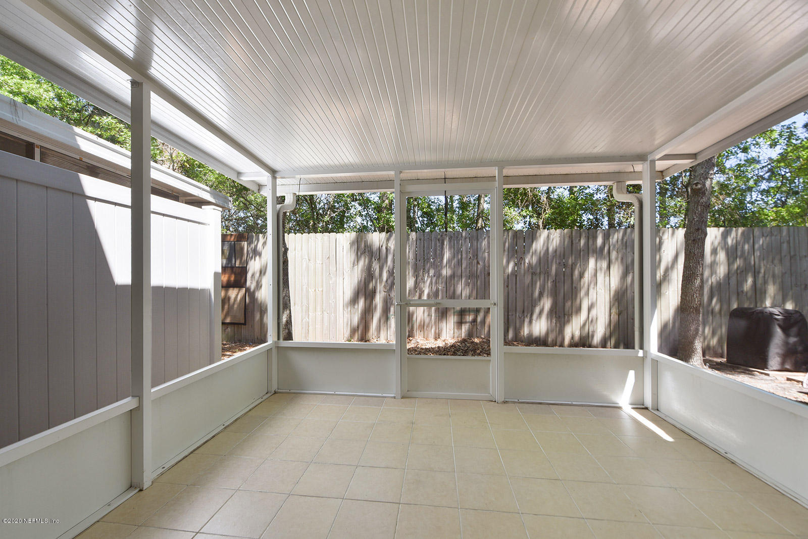 10543 Autumn Trace Road Jacksonville, FL 32257 - Photo 24 of 25 a view of entryway with window and wooden floor