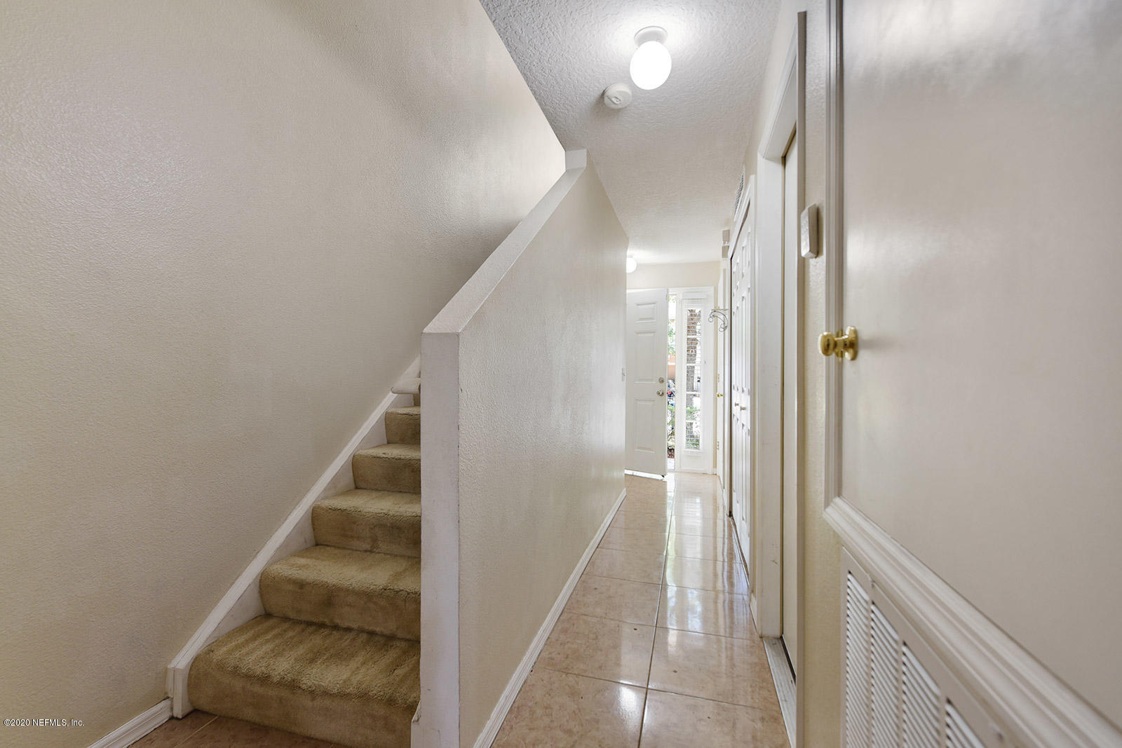 10543 Autumn Trace Road Jacksonville, FL 32257 - Photo 5 of 25 a view of entryway with furniture and wooden floor