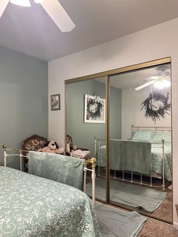 a bed room with a bed and a table
