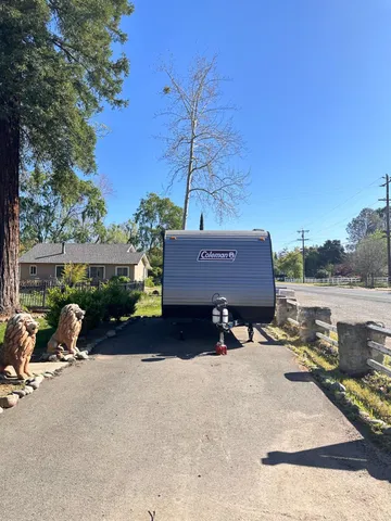 a view of house with outdoor space and seating area