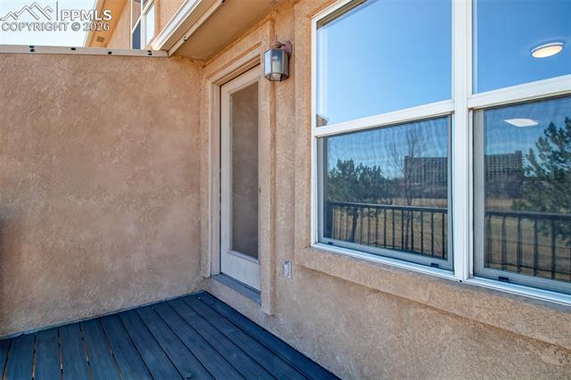 3579 Indigo Ridge Point Colorado Springs, CO 80910 - Photo 10 of 33 Walk out deck off living room