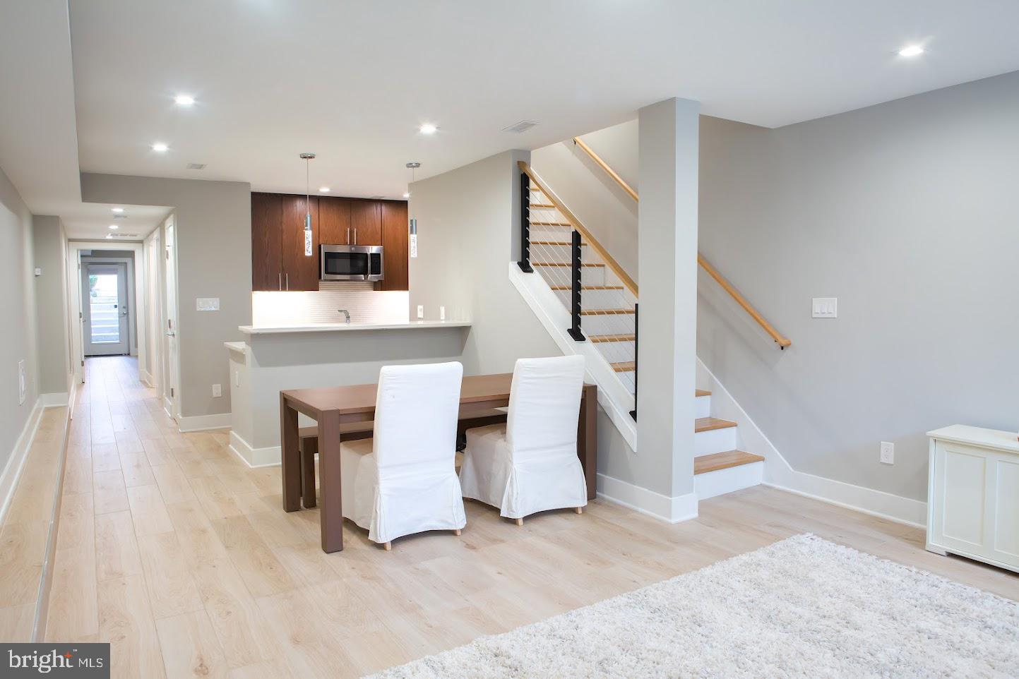 720 East Capitol Street Northeast Washington, DC 20003 - Photo 1 of 12 a view of entryway and hall with wooden floor